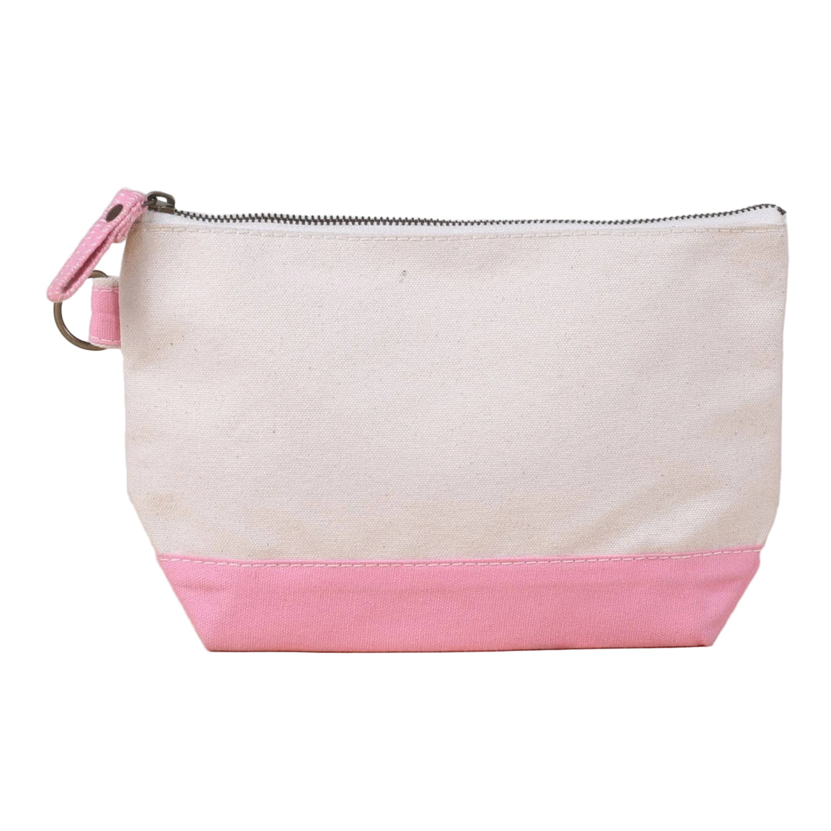 A canvas zippered pouch with a two-tone design, featuring an off-white top section and a pink bottom base, with a pink zipper pull and metal ring, resting on a light wooden surface against a plain light gray background.
